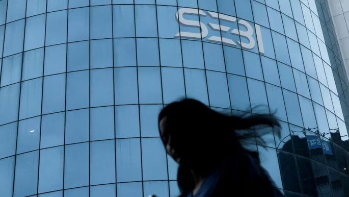 A woman walks past the Securities and Exchange Board of India (SEBI) headquarters in Mumbai, India, September 12, 2025. Photo: REUTERS/Francis Mascarenhas/File Photo/File Photo