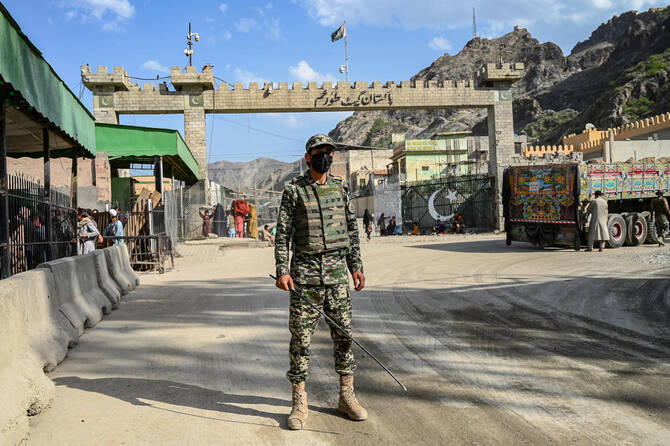 Above, a Pakistani border security near the zero point at the Torkham International Border Crossing in Nangarhar province on April 20, 2025. (AFP file photo)