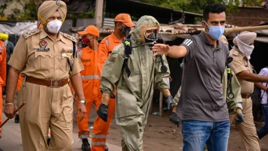 National Disaster Response Force (NDRF) and police personnel at the site after a gas leak incident in the Giaspura area, in Ludhiana district on April 30, 2023. | Photo Credit: PTI