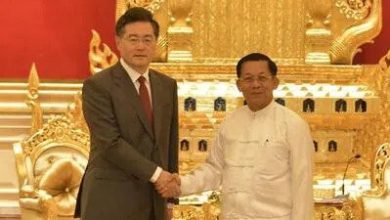 Senior Gen Min Aung Hlaing (right), head of Myanmar’s military council, shakes hands with Chinese foreign minister Qin Gang during their meeting in Naypyitaw, Myanmar, on Tuesday. Photo: AP