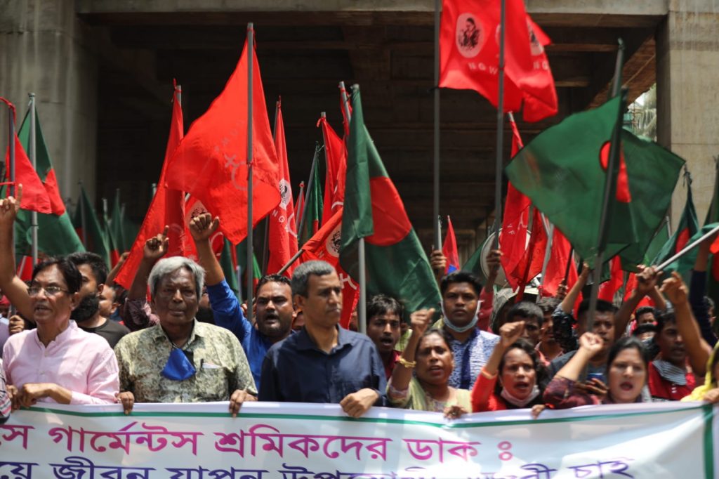 Workers from different sectors holding a rally to observe the historic May Day in Dhaka's Press Club area.