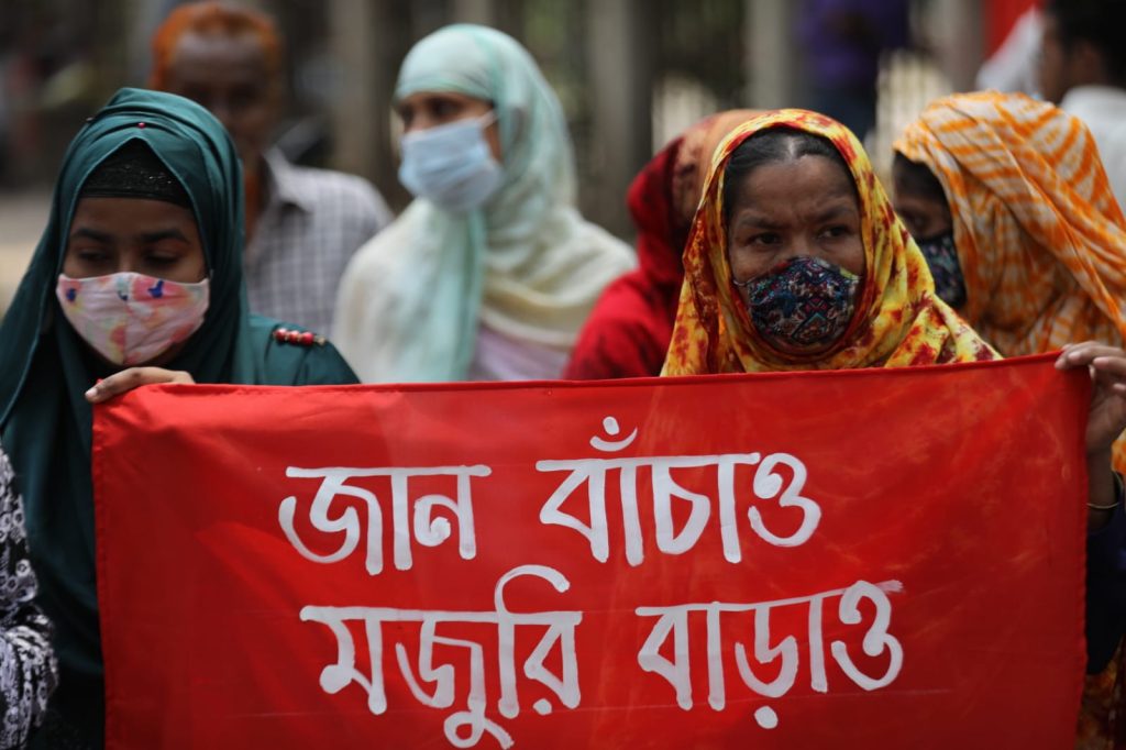 Workers from different sectors holding a rally to observe the historic May Day in Dhaka's Press Club area.