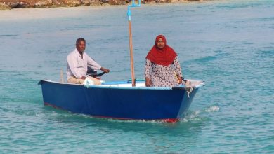 Ahmed Mohamed and Azeema on their dinghy; the exceptional couple from F. Nilandhoo. PHOTO: ISMAIL NASEER / MIHAARU