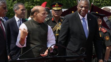 Indian Defense Minister Rajnath Singh, second from left, welcomes US Secretary of Defense, Lloyd Austin before their meeting, in New Delhi, India, Monday, June 5, 2023. (AP Photo/Manish Swarup)