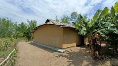 A Meitei Pangal house in Manipur's Kwakta, labelled as a 'Muslim area' [Angana Chakrabarti/Al Jazeera]