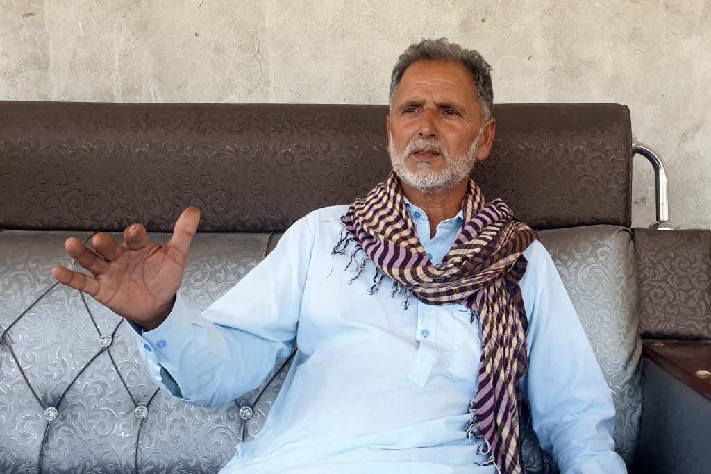 Muhammad Sarwar Bhatti, 53, brother of Hameed Iqbal Bhatti, 47, who along with others went missing when a migrant boat sunk off the coast of Greece, speaks with Reuters at his residence in Khuiratta, Pakistan-administered Kashmir, June 20, 2023. REUTERS/Salahuddin NO RESALES. NO ARCHIVES