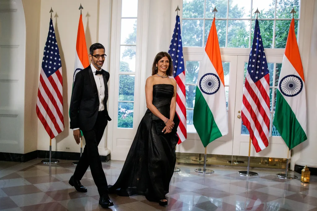 Sundar Pichai, chief executive officer of Alphabet Inc., and his wife, Anjali Pichai, at the White House in June. Mr. Modi relies on an exceptionally successful diaspora to spread the message of a strong India.Credit...Samuel Corum for The New York Times