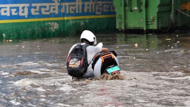 The early morning downpour created problems for the commuters as they faced heavy waterlogging leading to traffic jams. (Image Credit: ANI)