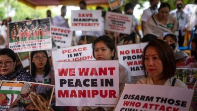 Women hold a sit-in protest against spiralling violence in Manipur