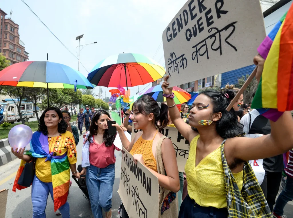 Members of Nepal’s LGBT+ community hold placards as they take part in a 2019 Pride Parade in Kathmandu. (PRAKASH MATHEMA/AFP/Getty Images)