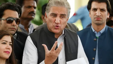 Shah Mahmood Qureshi (centre), former foreign minister and leader of Pakistan Tehreek-e-Insaf (PTI) party, was arrested for his alleged role in 'exposing official secrets and harming state interests' [File: Aamir Qureshi/AFP]