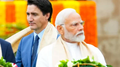 Prime Minister Justin Trudeau walks past Indian Prime Minister Narendra Modi during the G20 Summit in New Delhi earlier this month. During their meeting at the summit, Modi expressed frustration over growing anti-India sentiments within Canada. PHOTO BY SEAN KILPATRICK/THE CANADIAN PRESS/FILE