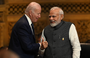 US President Joe Biden and Indian Prime Minister Narendra Modi shake hands.