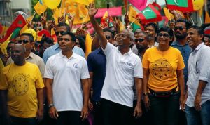 Ibrahim Mohamed Solih, the opposition candidate for the presidency, with supporters at his final campaign rally