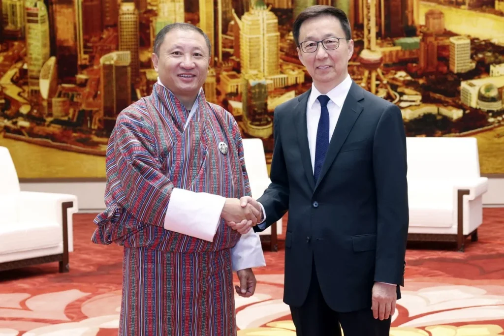 Bhutanese Foreign Minister Tandi Dorji (left) meets Chinese Vice-President Han Zheng in Beijing on Tuesday. Photo: Xinhua