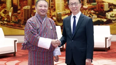 Bhutanese Foreign Minister Tandi Dorji (left) meets Chinese Vice-President Han Zheng in Beijing on Tuesday. Photo: Xinhua