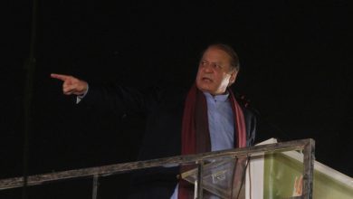 FILE PHOTO: Pakistan's former Prime Minister Nawaz Sharif addresses supporters upon his arrival from a self-imposed exile in London, ahead of the 2024 Pakistani general election, in Lahore, Pakistan October 21, 2023. REUTERS/Mohsin Raza/File Photo
