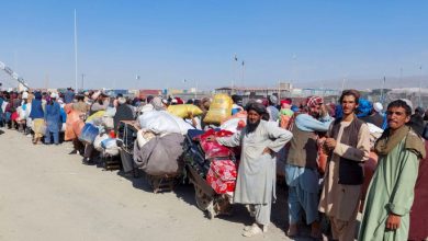 Afghan citizens wait with their belongings to cross into Afghanistan, after Pakistan gives the last warning to undocumented immigrants to leave, at the Friendship Gate of Chaman Border Crossing along the Pakistan-Afghanistan Border in Balochistan Province, in Chaman, Pakistan October 31, 2023. REUTERS/Abdul Khaliq Achakzai