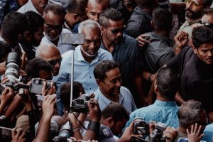 Former president Abdulla Yameen Abdul Gayoom greets supporters gather outside his residence on October 1, 2023. (Sun Photo/Maahil Athif)