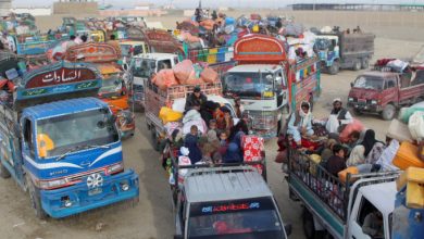 FILE PHOTO: Afghan nationals with their belongings travel on vehicles as they head back to Afghanistan, after Pakistan gave a final warning to undocumented immigrants to leave, at the Friendship Gate of Chaman Border Crossing along the Pakistan-Afghanistan Border in Balochistan Province, in Chaman, Pakistan November 4, 2023. REUTERS/Naseer Ahmed/File photo