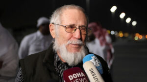 Released taliban hostage and Austrian national Herbert Fritz speaks with the media after disembarking from a plane, in Doha, Qatar, 25 February 2024. Photo: REUTERS/Arafat Barbakh