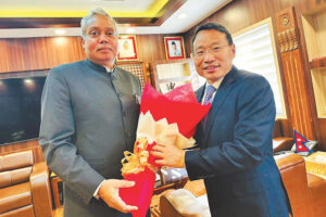 Indian envoy Naveen Srivastava (left) and Nepal’s Finance Minister Barsha Man Pun. Photo: Md Imran Hasan