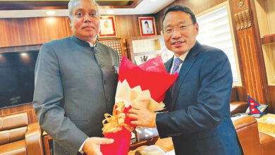Indian envoy Naveen Srivastava (left) and Nepal’s Finance Minister Barsha Man Pun. Photo: Md Imran Hasan