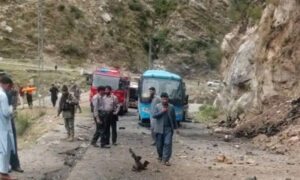 Security personnel inspect the site of a suicide attack near Besham city in the Shangla district of Khyber Pakhtunkhwa province on March 26, 2024. (AFP/File)