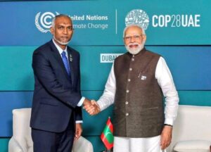 Maldivian President Mohamed Muizzu (left) with IndianPrime Minister Narendra Modi (right) during their first
meeting in UAE.