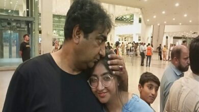 A MAN greets a student who returned from Kyrgyzstan at the Islamabad International Airport, on Sunday.—Dawn