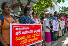 Protesters near the Russian embassy in Colombo seeking the release of Sri Lankan ex-soldiers who joined forces fighting in Ukraine after Russia's invasion. (File photo: AFP/Ishara S Kodikara)