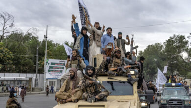 Taliban fighters celebrate one year since they seized the Afghan capital, Kabul, in front of the U.S. Embassy in Kabul, Afghanistan, Monday, Aug. 15, 2022. The Taliban on Tuesday, July 30, 2024,