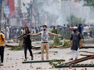 Protesters clash with guards and police as violence erupts across Bangladesh after anti-quota protests by students in Dhaka. Photograph: Mohammad Ponir Hossain/Reuters