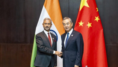 This photo obtained from the Indian Foreign Minister Subrahmanyam Jaishankar’s X account shows Jaishankar, left, with his Chinese counterpart Wang Yi in Vientiane, Laos, Thursday, July 25, 2024. (X via AP)