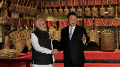 Chinese President Xi Jinping and Indian Prime Minister Narendra Modi shake hands as they visit the Hubei Provincial Museum in Wuhan, Hubei province, China April 27, 2018. China Daily via REUTERS/File Photo