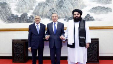 The foreign ministers of China, Pakistan and Afghanistan met on May 21, 2025, in Beijing [Handout/Ministry of Foreign Affairs, the People’s Republic of China]