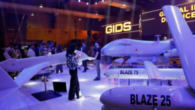 Visitors inspect the Global Industrial & Defence Solutions (GIDS) unmanned combat aerial vehicle (UCAV) Shahpar during the International Defence Exhibition and Seminar (IDEAS 2024) in Karachi, Pakistan November 21, 2024. Photo: REUTERS/Akhtar Soomro