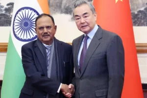 Chinese Foreign Minister Wang Yi with Indian National Security Adviser Ajit Doval, in Beijing on December 18. Photo: EPA-EFE
