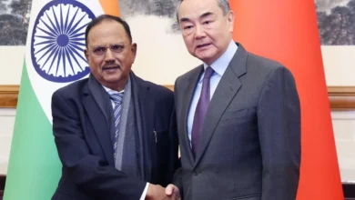 Chinese Foreign Minister Wang Yi with Indian National Security Adviser Ajit Doval, in Beijing on December 18. Photo: EPA-EFE