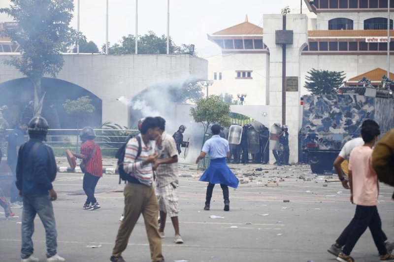 Young Gen Z protesters clash with police after breaking barricades outside the Federal Parliament in Kathmandu, Nepal, on Monday, September 8, 2025. Photo: Skanda Gautam/THT