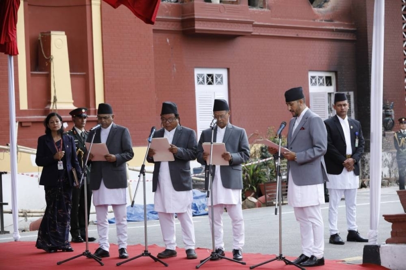 President Ram Chandra Paudel administers the oath of office to newly appointed ministers at Sheetal Niwas on Monday. The newly sworn-in ministers include Anilkumar Sinha, Mahavir Pun, Jagdish Kharel, and Dr. Madan Pariyar. Photo: RSS