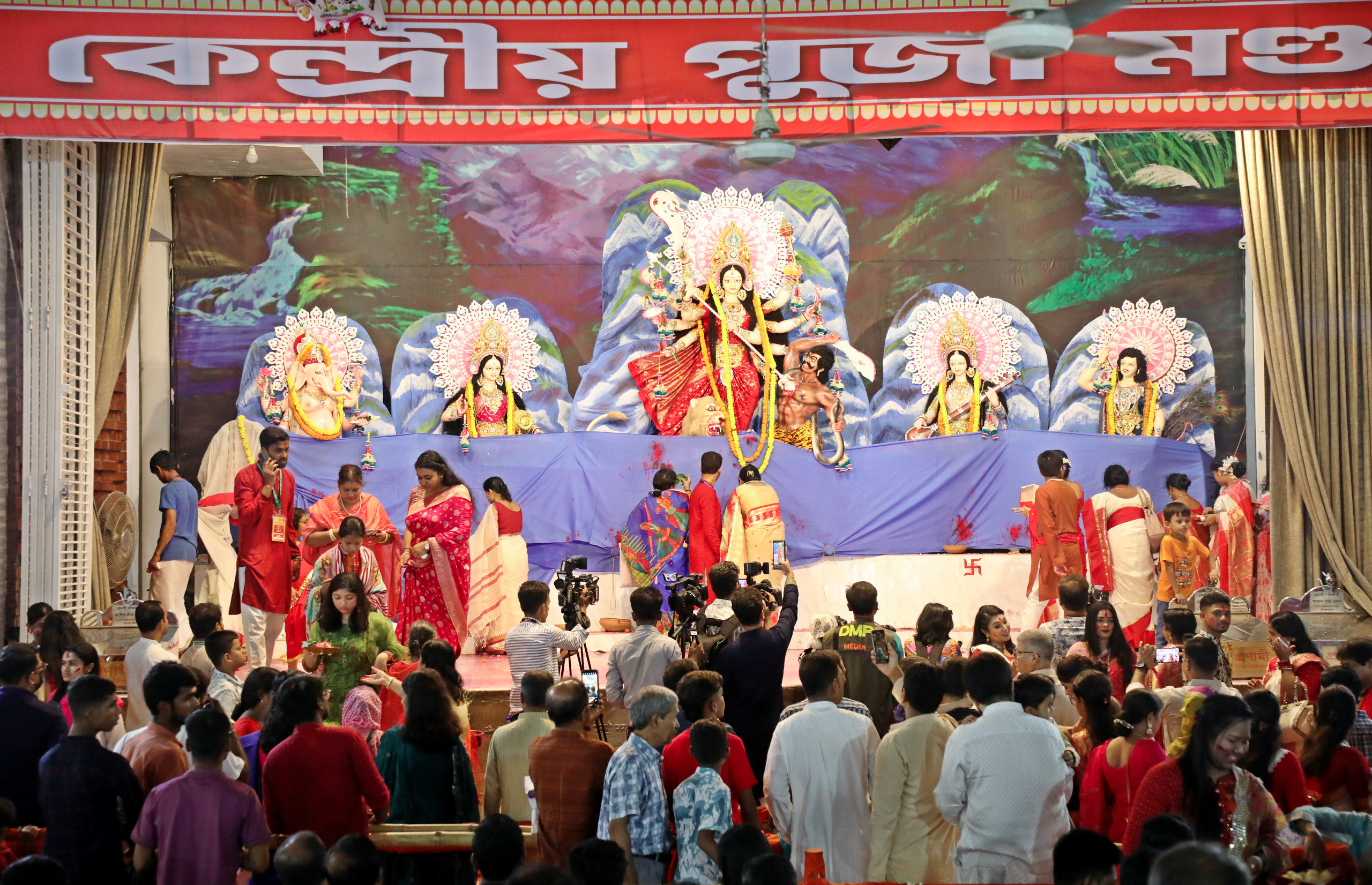 As dusk falls on Dashami and the idols dissolve into rivers from the Buriganga to the Karnaphuli, the message echoes across 