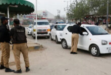 Police officers check vehicles as a security measure, following exchanges of fire between Pakistani and Afghan forces, along a road leading to the airport in Karachi, Pakistan, February 28, 2026. Photo: REUTERS/Asim Hafeez/File Photo
